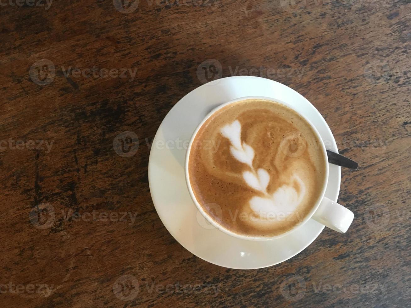 coffee cup hot coffee on wooden table photo