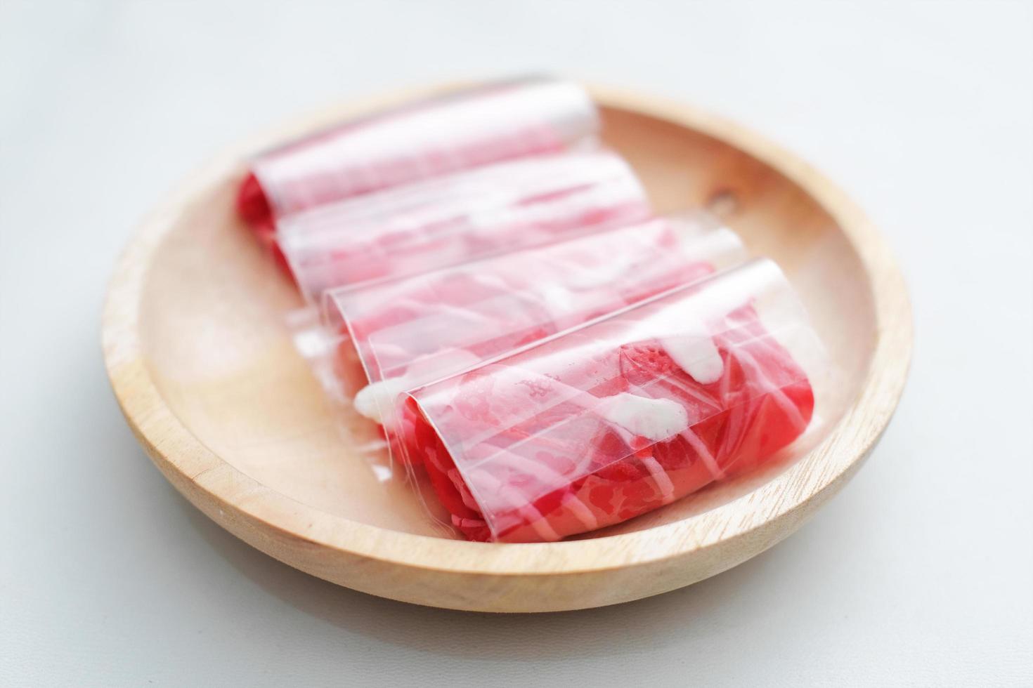 Red Roll Cake - Roll cake isolated on white background photo