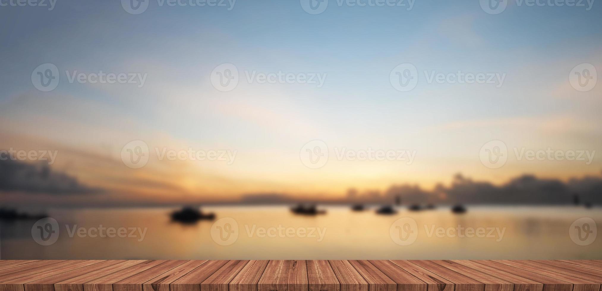 Empty light wood table top with landscape blurred background photo