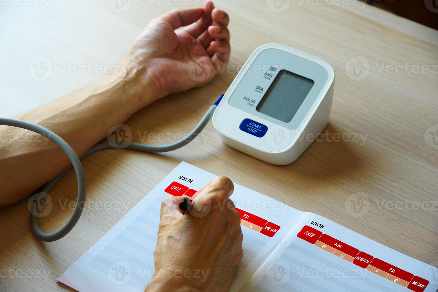 Self blood pressure measuring at home photo