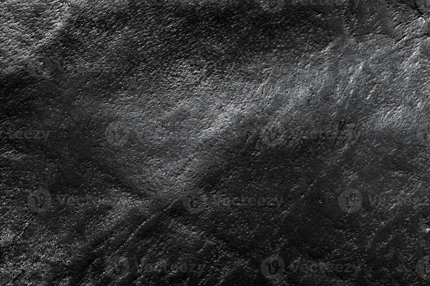 Genuine black leather background, pattern, texture. photo