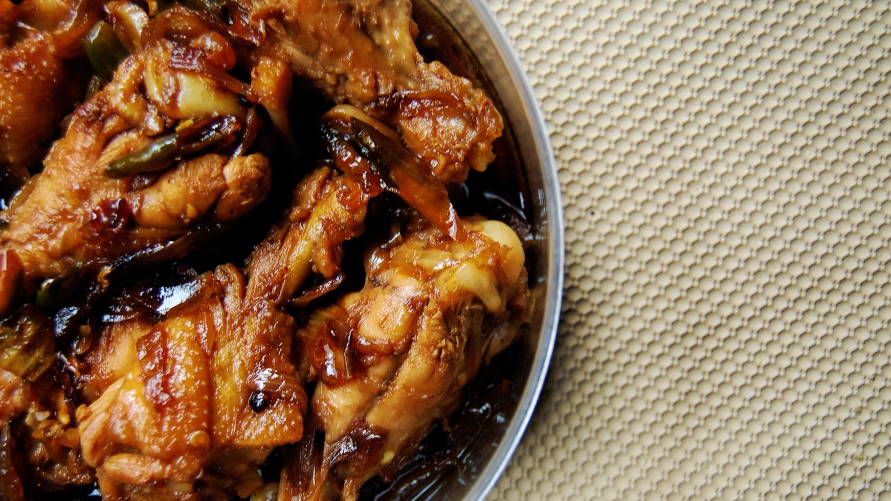 Soy sauce fried chicken with lots of spices photo