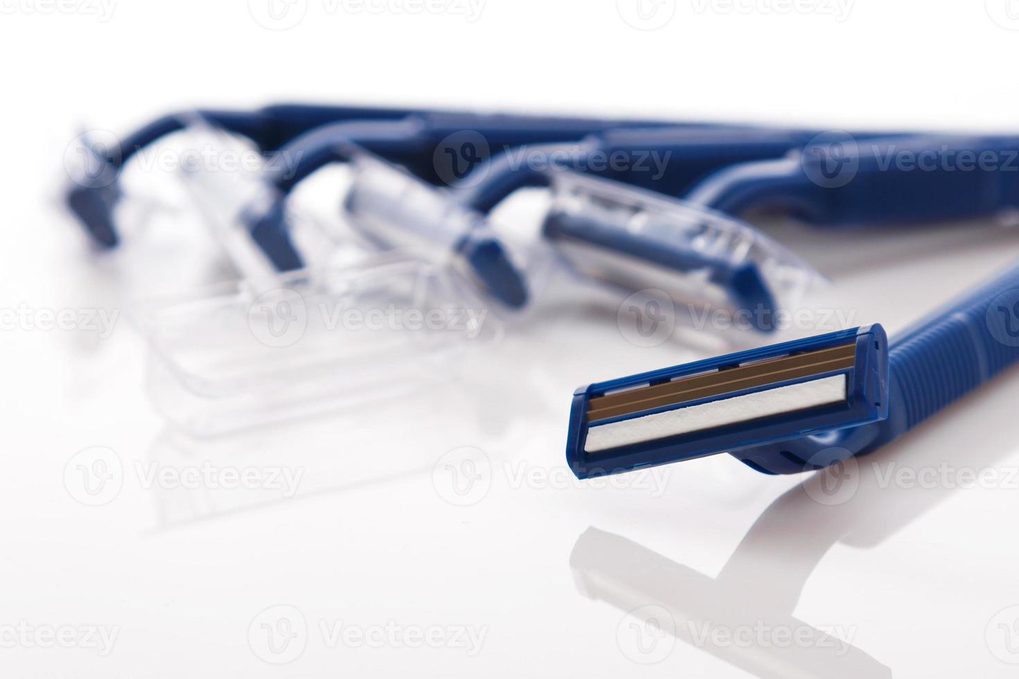 Shaving razor on white background photo