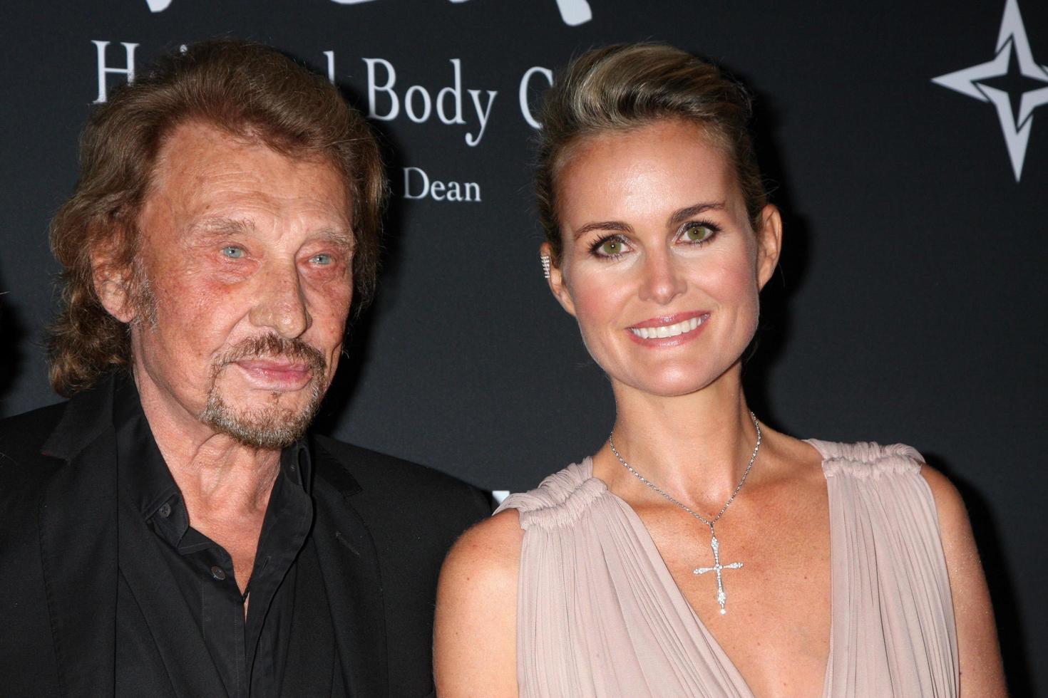 LOS ANGELES, OCT 19 -  Johnny Hallyday, Laeticia Hallyday at the 2013 Pink Party at Hanger 8 on October 19, 2013 in Santa Monica, CA photo