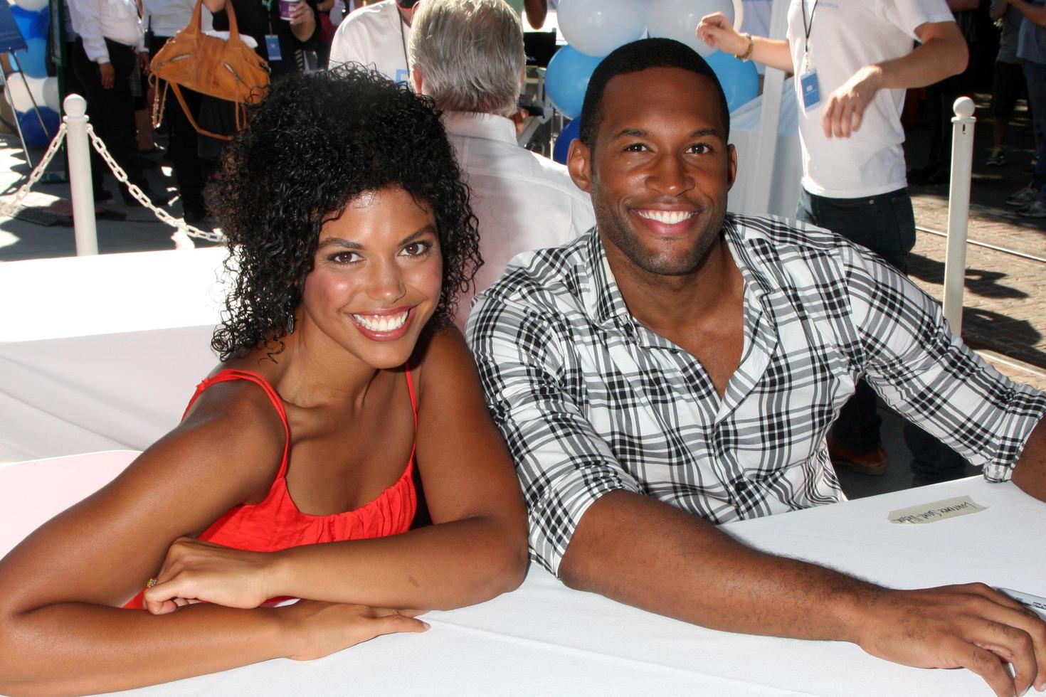 LOS ANGELES, AUG 23 -  Karla Mosley, Lawrence Saint-Victor at the Bold and Beautiful Fan Meet and Greet at the Farmers Market on August 23, 2013 in Los Angeles, CA photo
