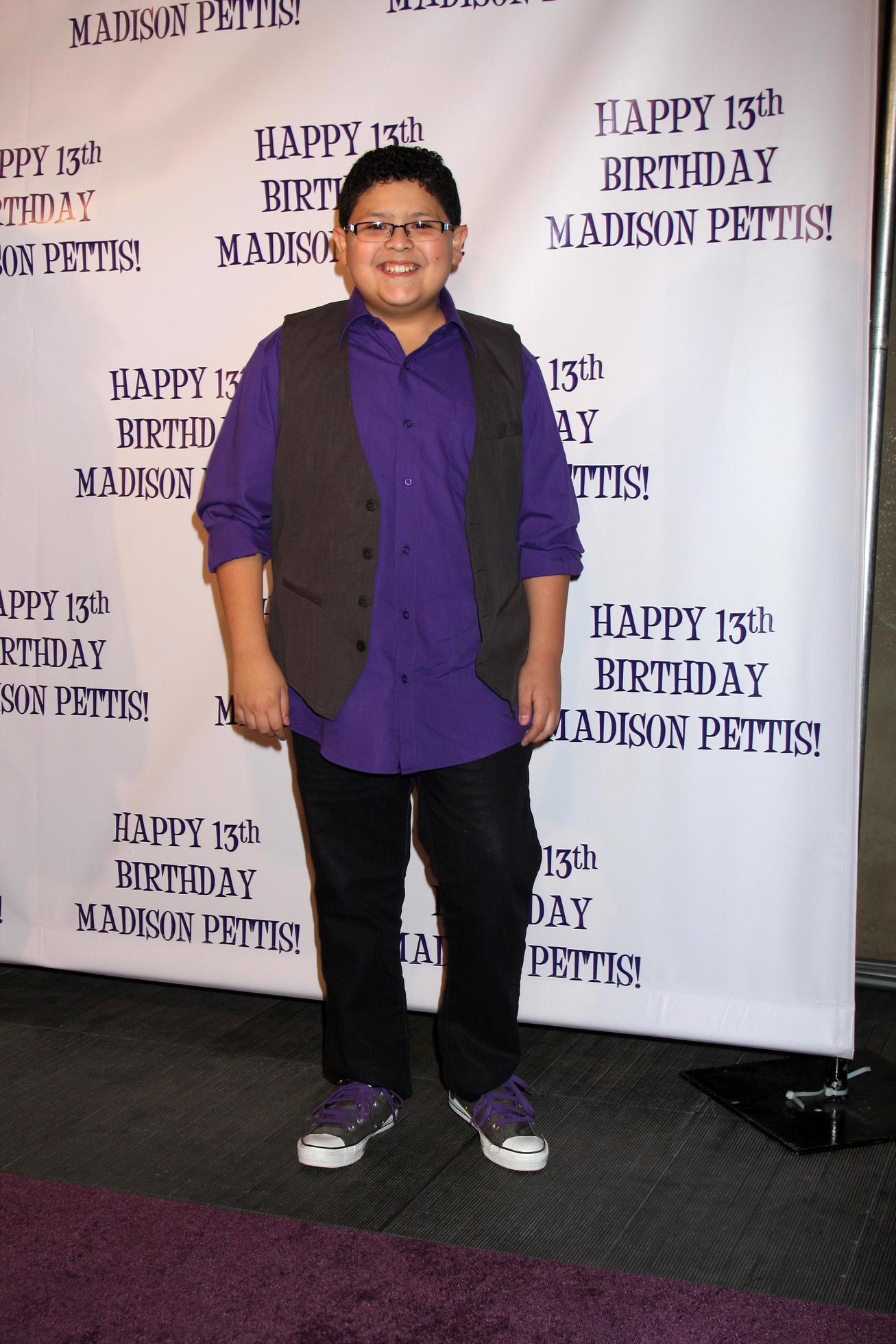 LOS ANGELES, JUL 31 - Rico Rodriguez arriving at the13th Birthday Party
