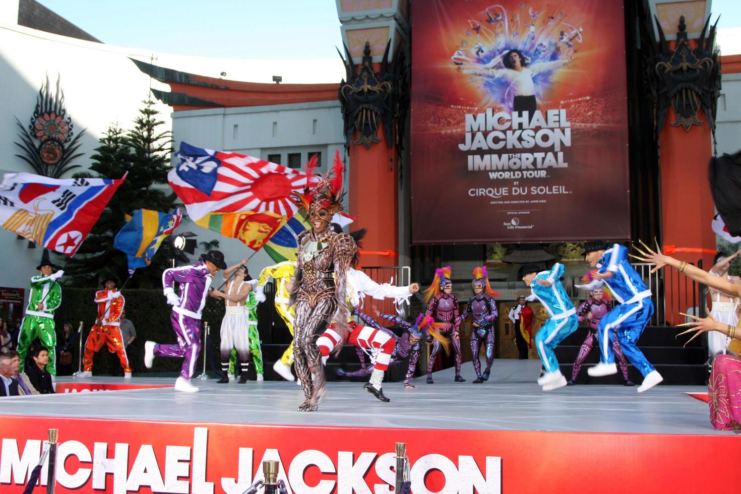 LOS ANGELES, JAN 26 - Cirque du Soleil Immortal Troupe perform at the Michael Jackson Immortalized Handprint and Footprint Ceremony at Graumans Chinese Theater on January 26, 2012 in Los Angeles, CA photo