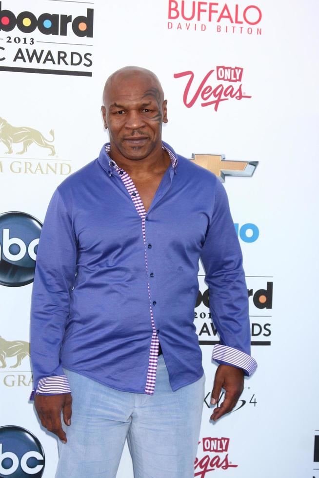 LOS ANGELES, MAY 19 - Mike Tyson arrives at the Billboard Music Awards 2013 at the MGM Grand Garden Arena on May 19, 2013 in Las Vegas, NV photo