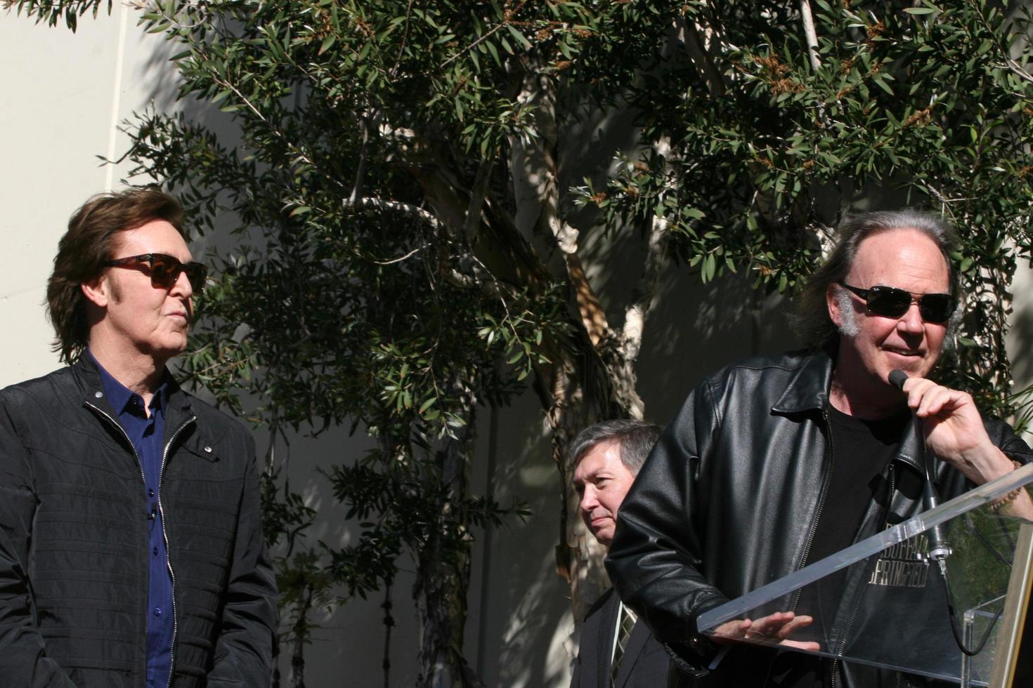 LOS ANGELES, FEB 9 - Paul McCartney, Neil Young at the Hollywood Walk of Fame Ceremony for Paul McCartney at Capital Records Building on February 9, 2012 in Los Angeles, CA photo