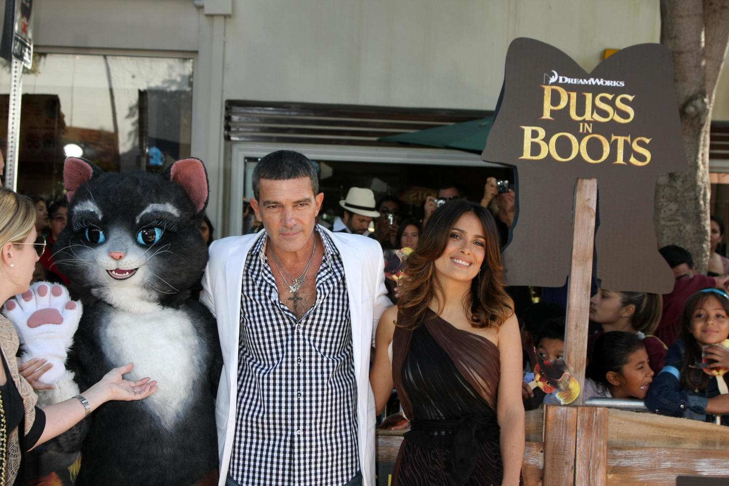 LOS ANGELES, OCT 23 - Antonio Banderas, Salma Hayek arriving at the Puss In Boots Premiere at the Regency Village Theater on October 23, 2011 in Westwood, CA photo