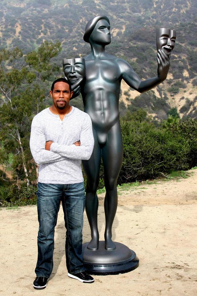 LOS ANGELES, JAN 20 - Jason George, Screen Actor s Guild Actor, Hollywood Sign at the AG Awards Actor Visits The Hollywood Sign at a Hollywood Hills on January 20, 2015 in Los Angeles, CA photo