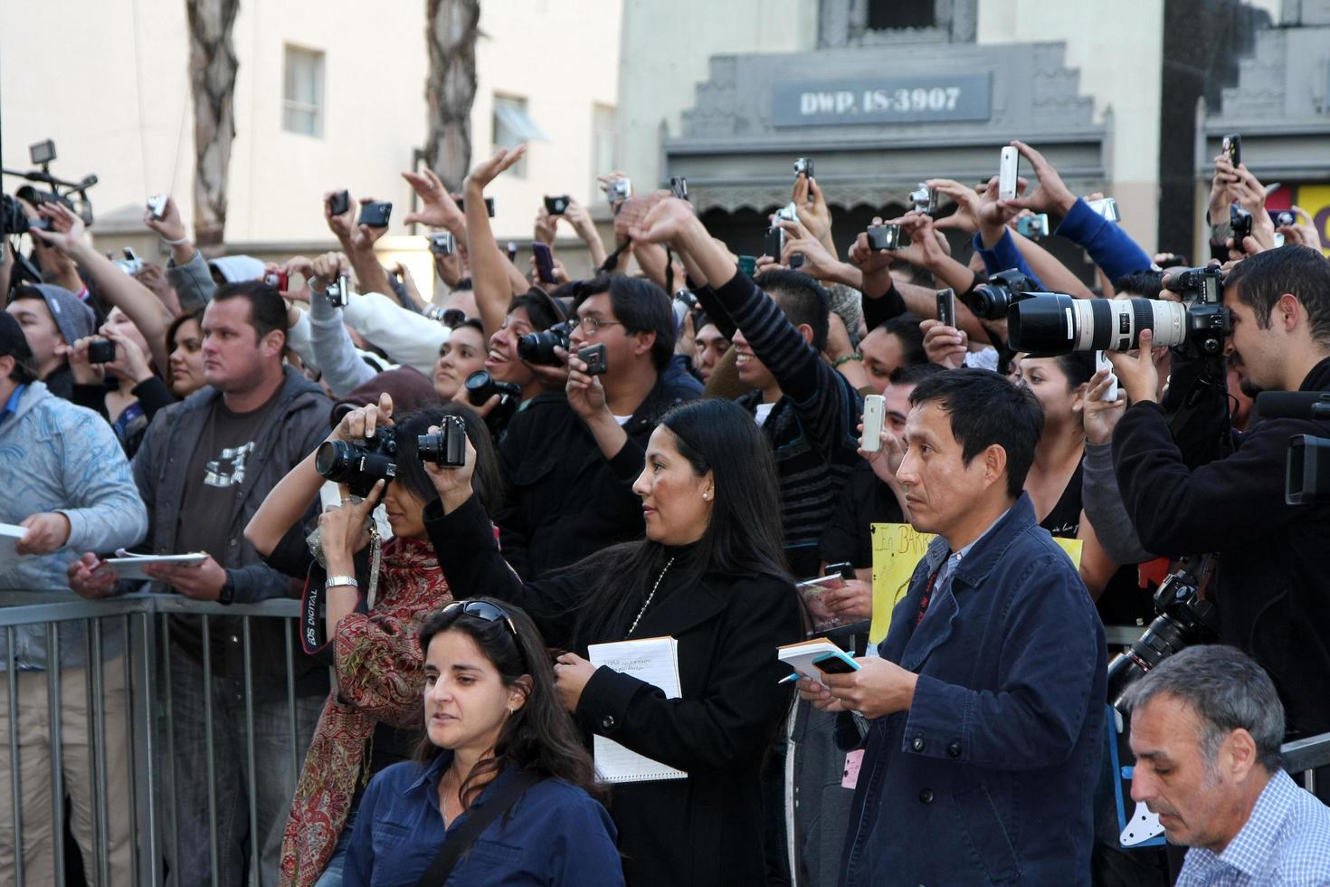 LOS ANGELES, NOV 8 - Fans at the Hollywood Walk of Fame Ceremony bestowing a star on Shakira at W Hollywood on November 8, 2011 in Los Angeles, CA photo