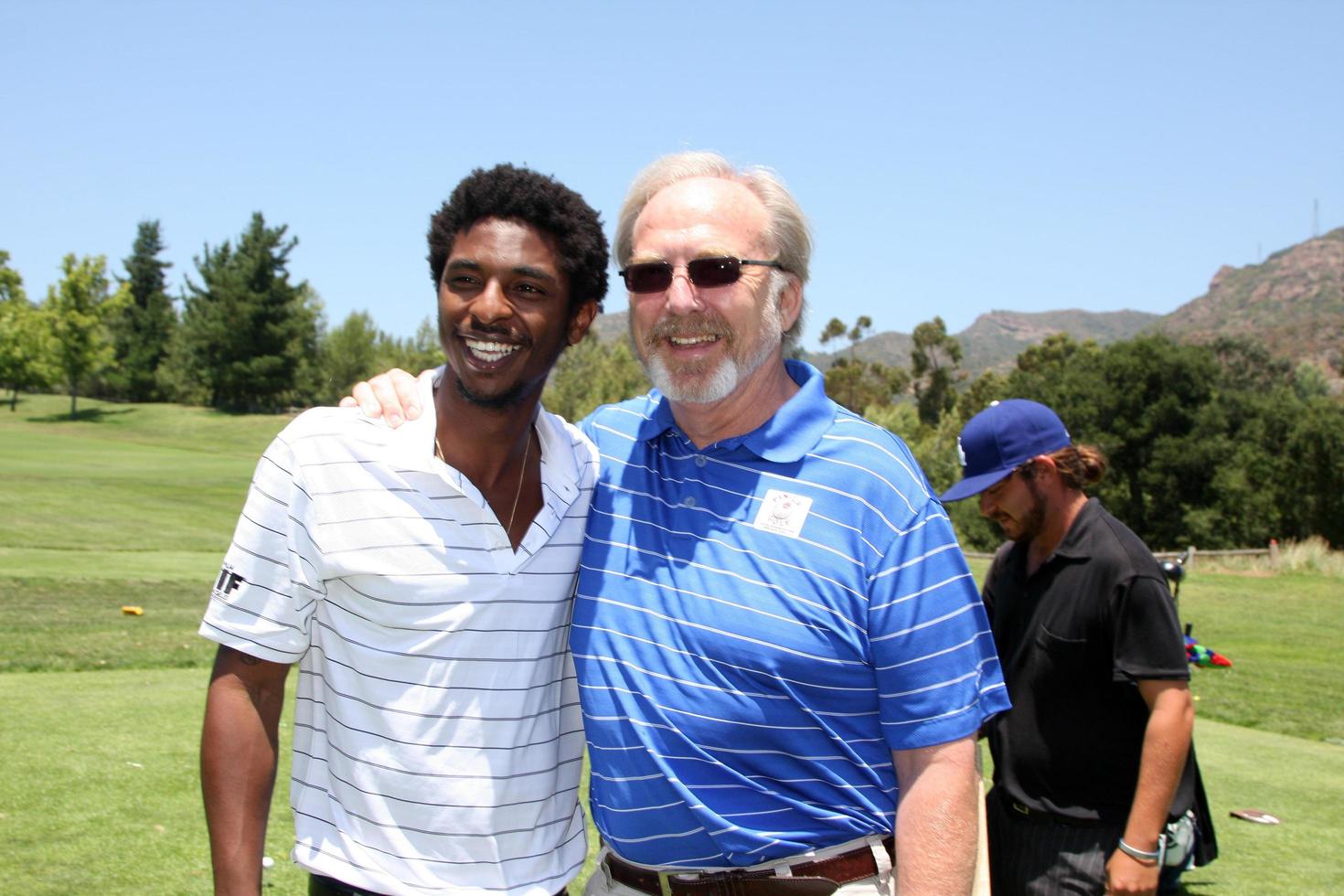 LOS ANGELES, JUL 9 - Shwayze, James Keach at the 14th Annual Women In Film Malibu Golf Classic at Malibu Country Club on July 9, 2011 in Malibu, CA photo
