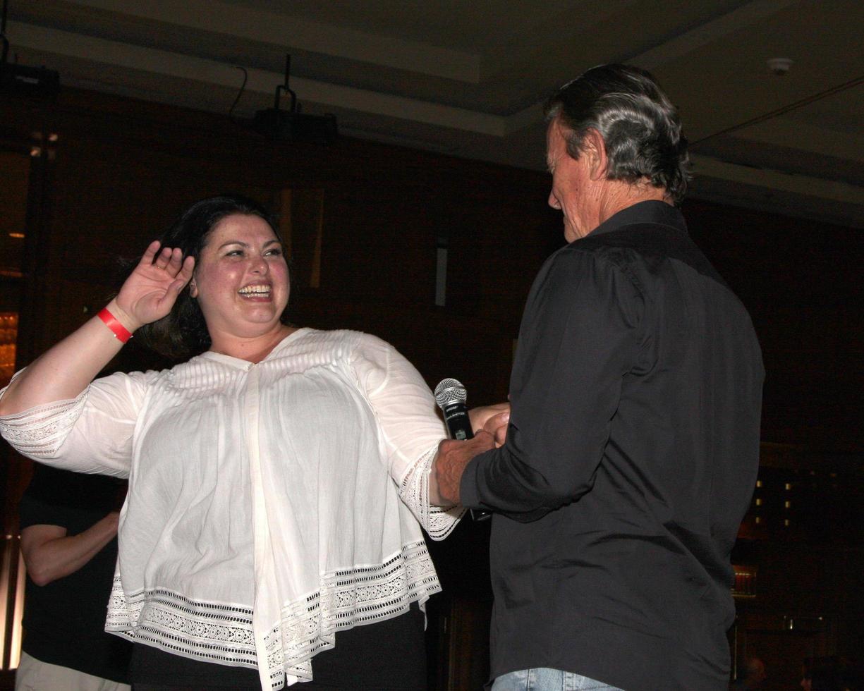 LOS ANGELES, AUG 26 - Eric Braeden, Girl from Audience Who Won attending the Young and Restless Fan Dinner 2011 at the Universal Sheraton Hotel on August 26, 2011 in Los Angeles, CA photo