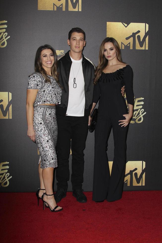 LOS ANGELES, APR 9 - Dana Teller, Miles Teller, Kaleigh Sperry at the 2016 MTV Movie Awards Arrivals at the Warner Brothers Studio on April 9, 2016 in Burbank, CA photo