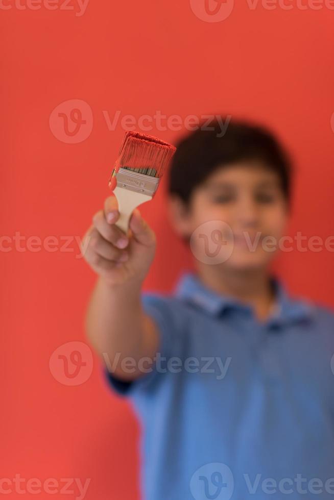 Portrait of a happy young boy painter photo