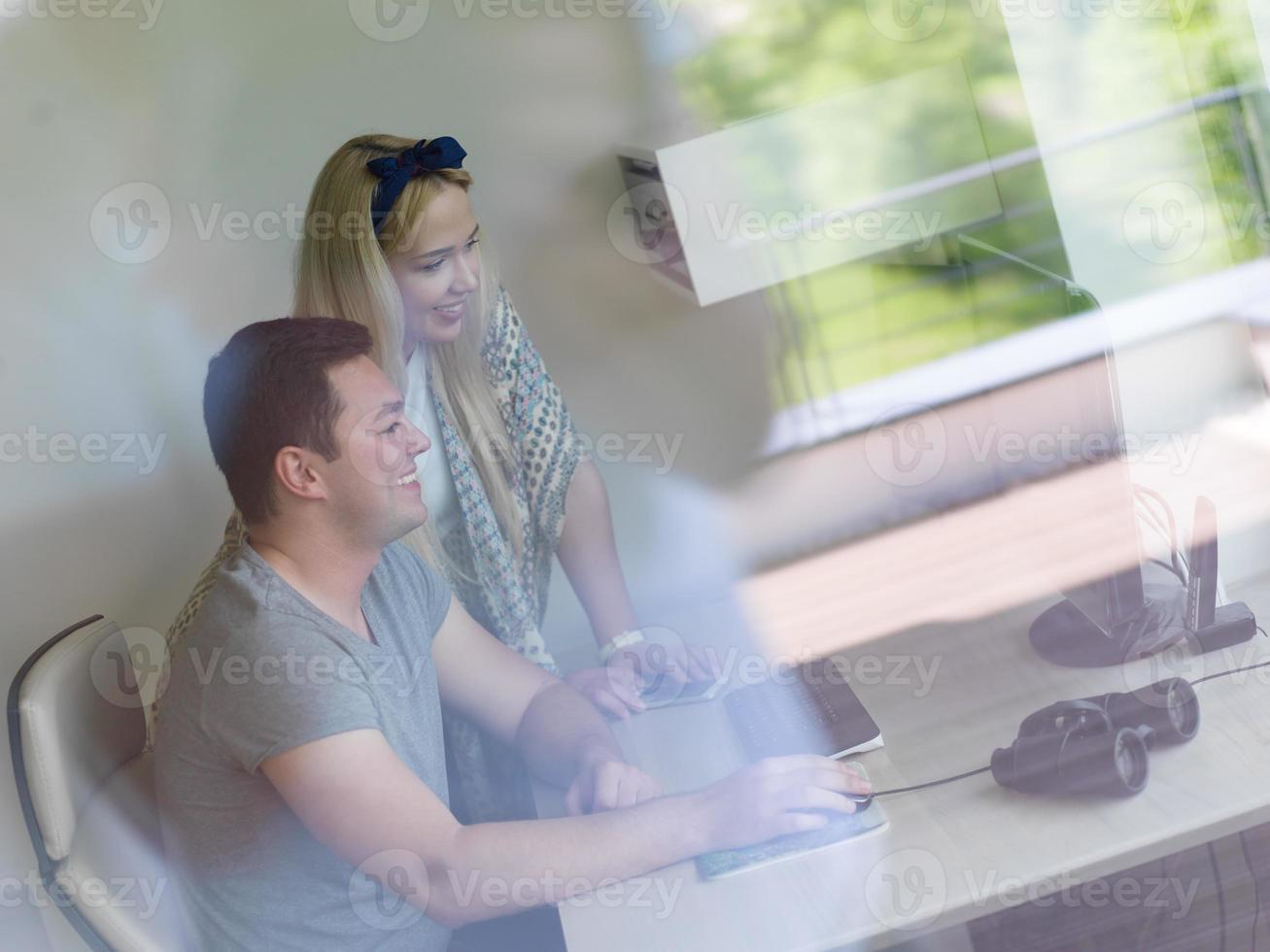 man and woman operators of security systems photo