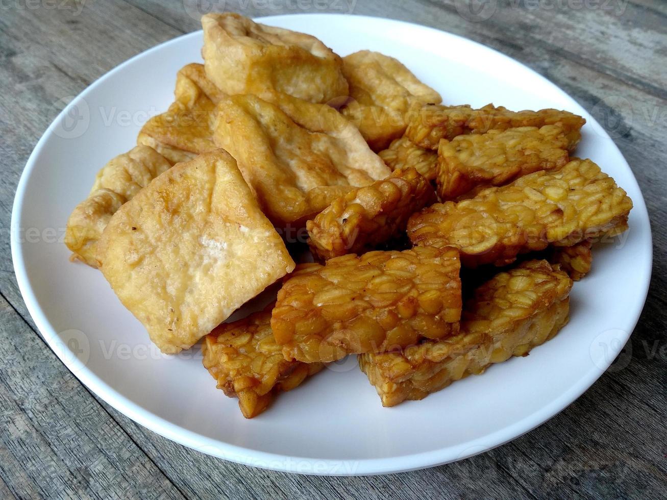 Tempe goreng or Fried Tempeh on a plate. Indonesian culinary food