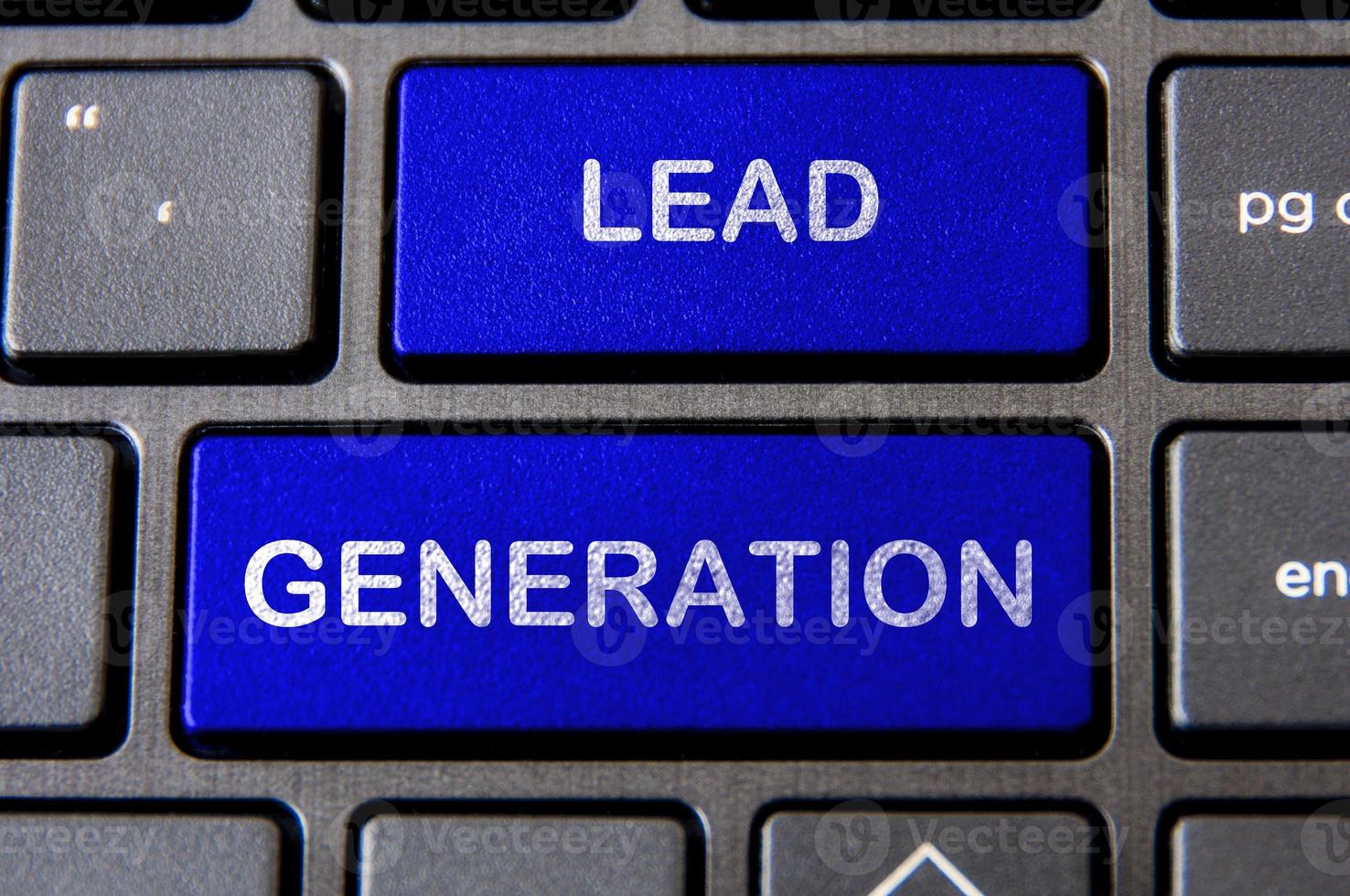 Online business and list building concept - Laptop keyboard with blue Lead Generation button. photo