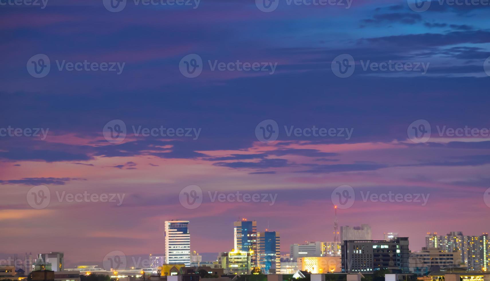 The colorful sky at sunset during twilight after the rain, gives a dramatic feeling, a bird-eye view of the city at twilight, a beautiful sky with clouds,Sky background with clouds,Nature abstract. photo