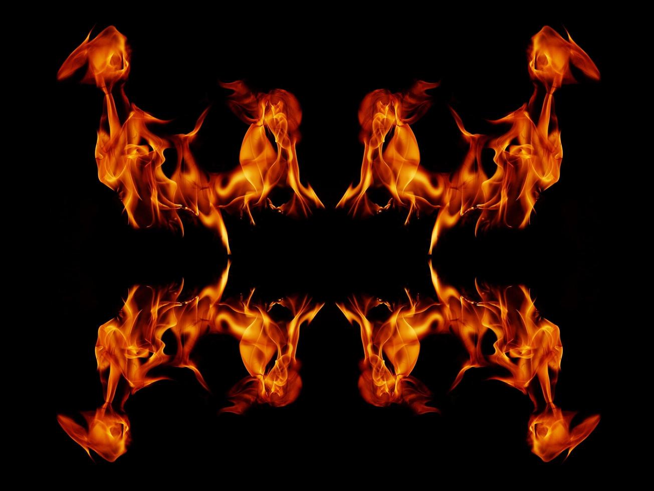 A beautiful flame shaped as imagined. like from hell, showing a dangerous and fiery fervor, black background. photo