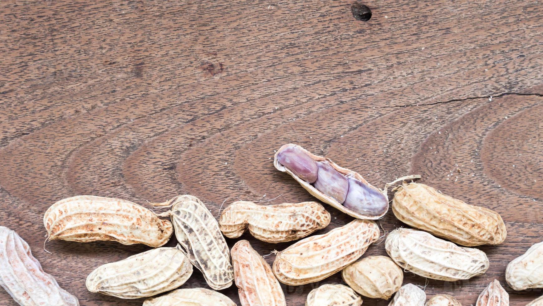 Boiled Peanuts on wooden table background. photo