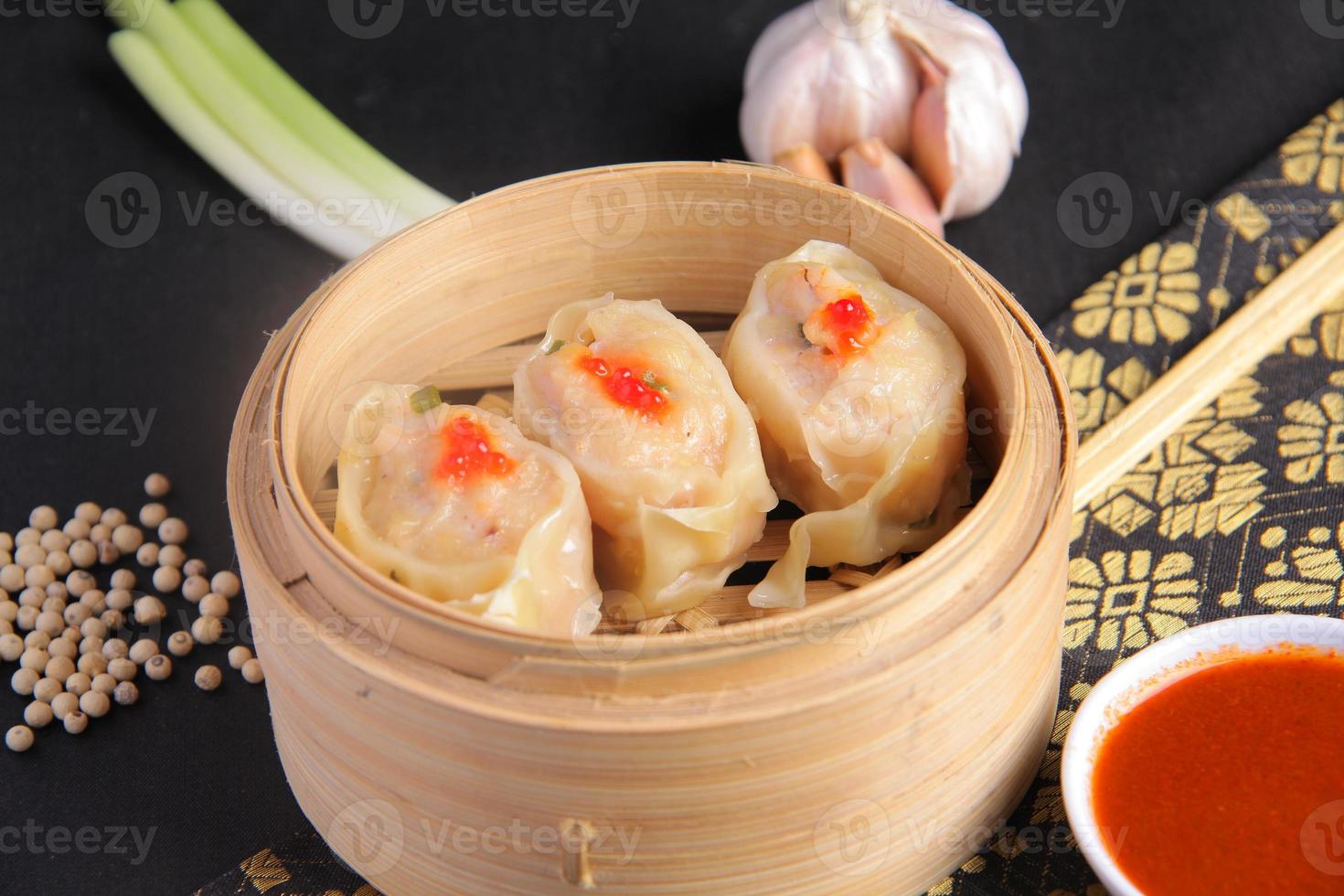 Chicken Dim Sum with Delicious Sauce, Tasty and Juicy Chinese Food photo