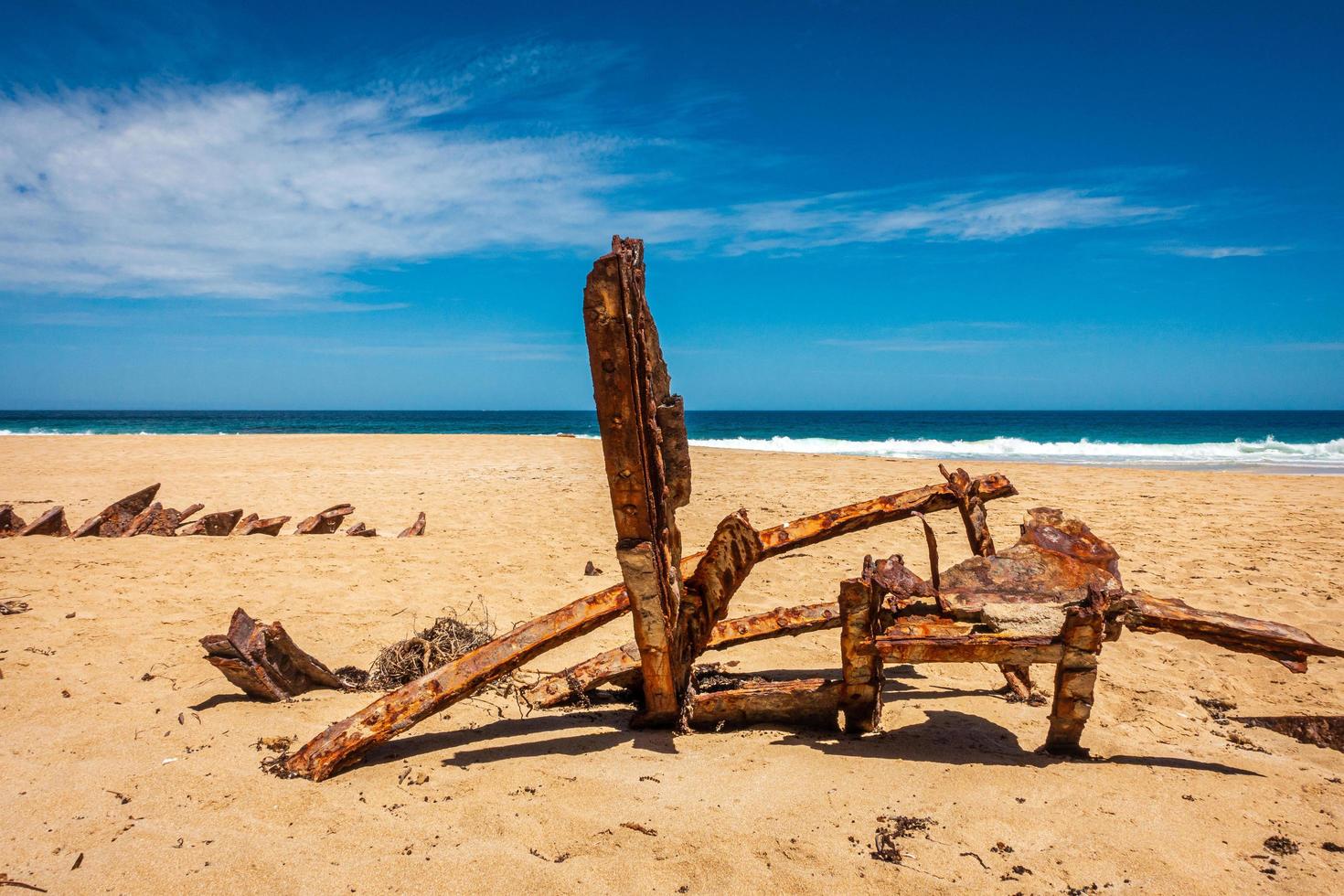 Ship wreck on beach photo