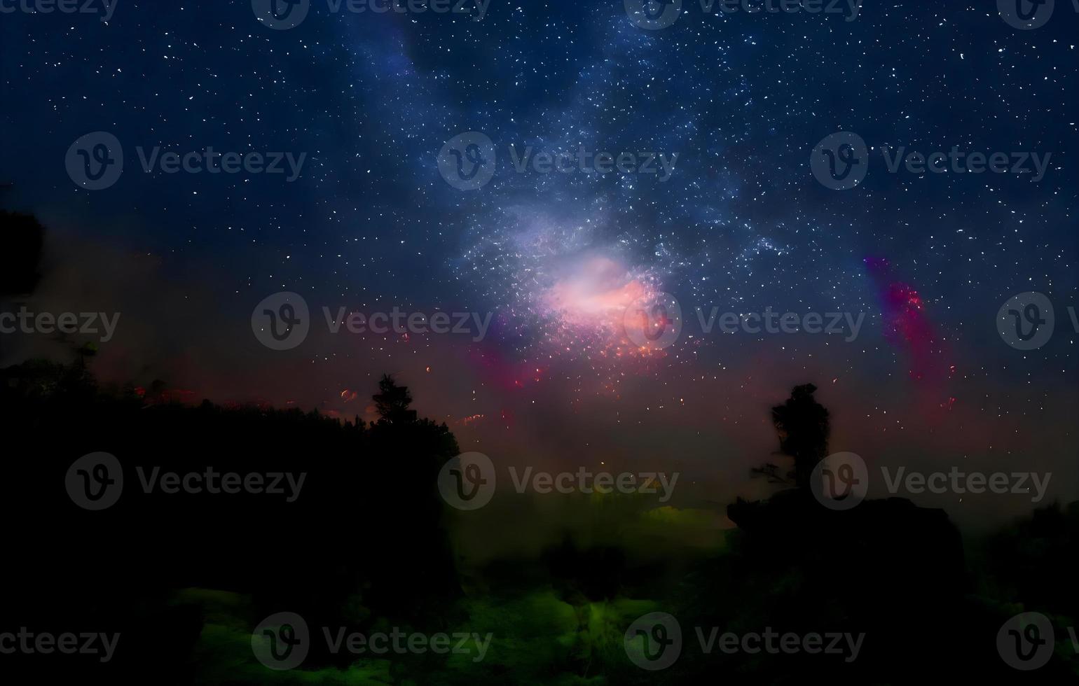 Milky Way and pink light at mountains. Night colorful landscape. Starry sky with hills at summer. Beautiful Universe. Space background with galaxy. Travel background photo