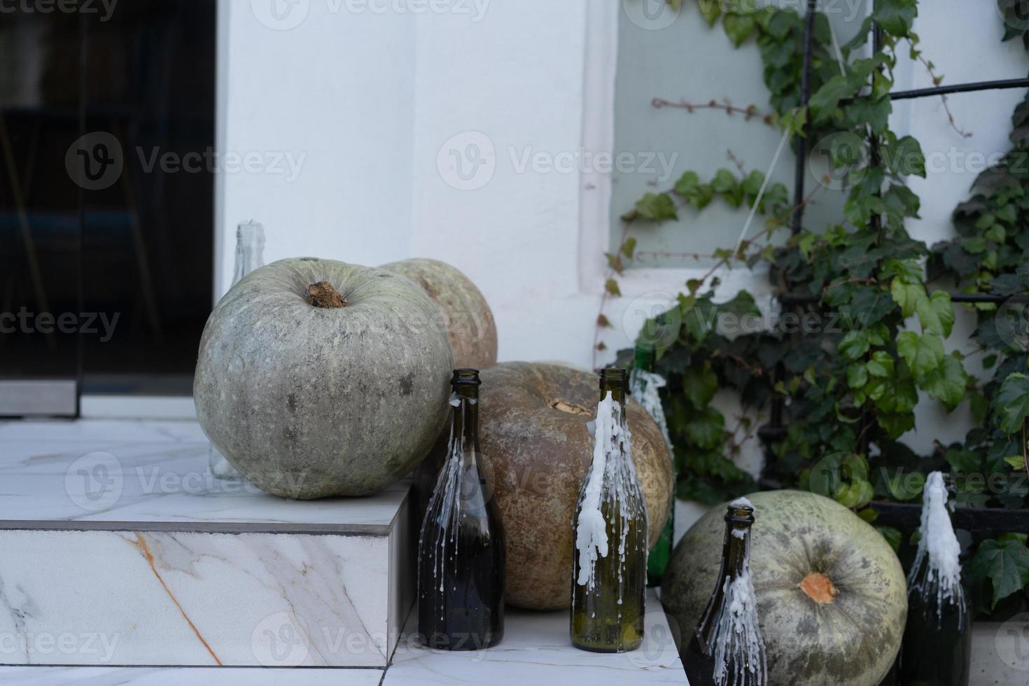 Autumn decoration with pumpkins on a street photo