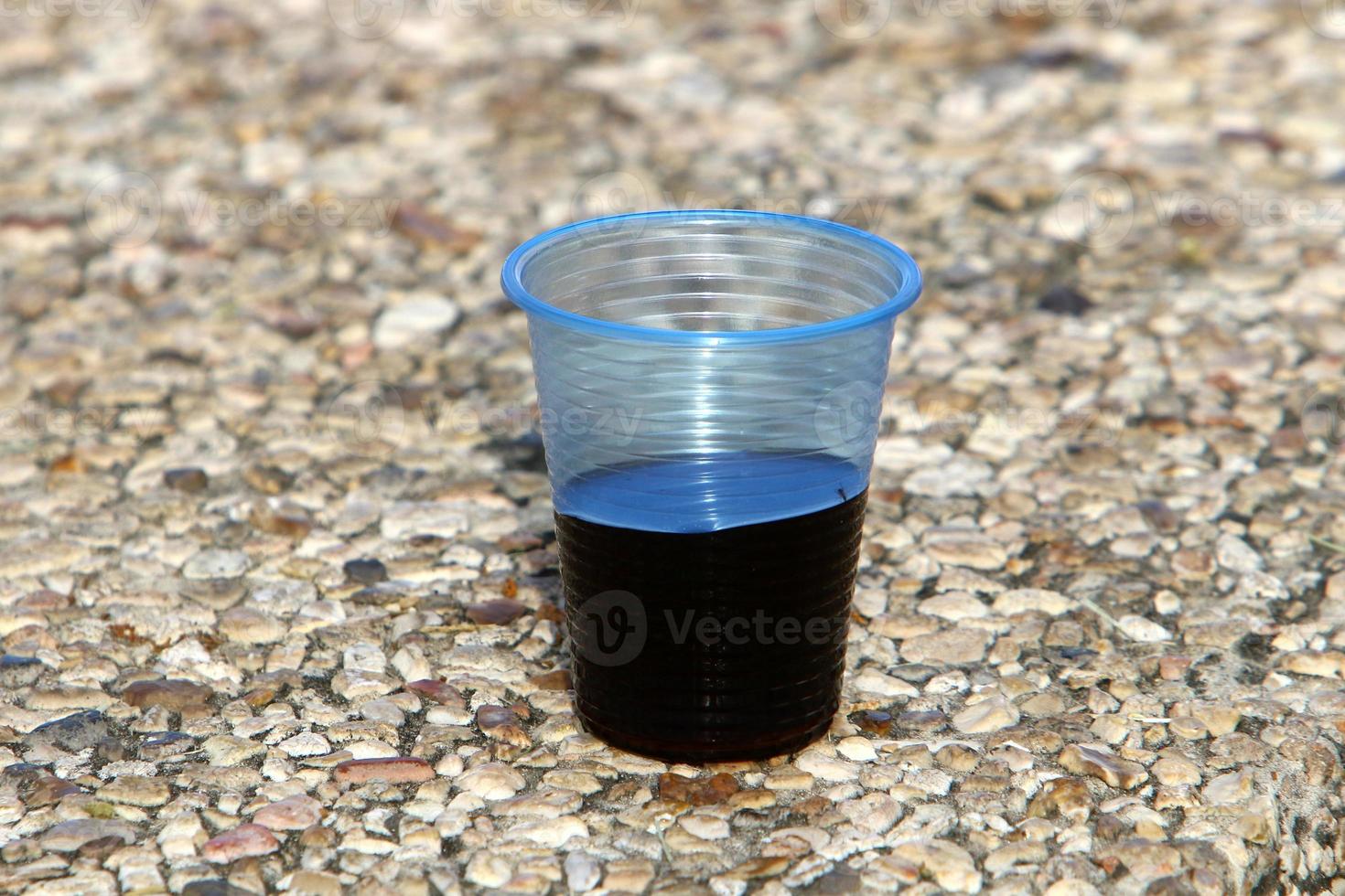 On the table in a glass of soft drinks. photo