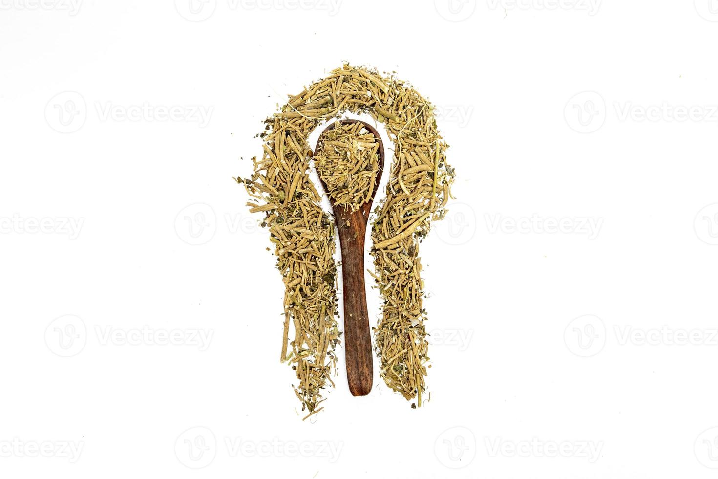 Ashwagandha or Aswaganda OR Indian Ginseng is an Ayurveda medicine Isolated on plain background photo