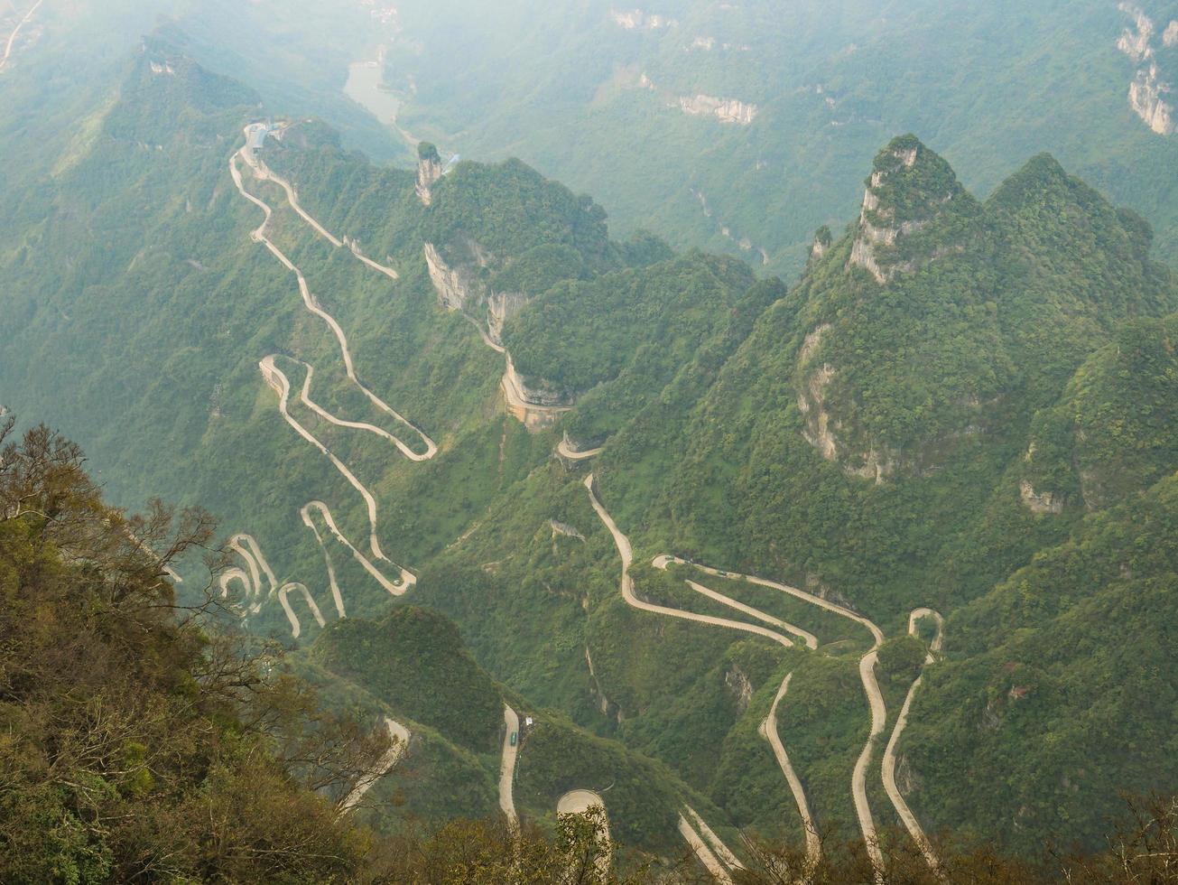 Beautiful Top view of Tongtian Road the winding Road  99  curves road to The Heaven's Gate, Zhangjiagie, Tianmen Mountain National Park, Hunan, China photo