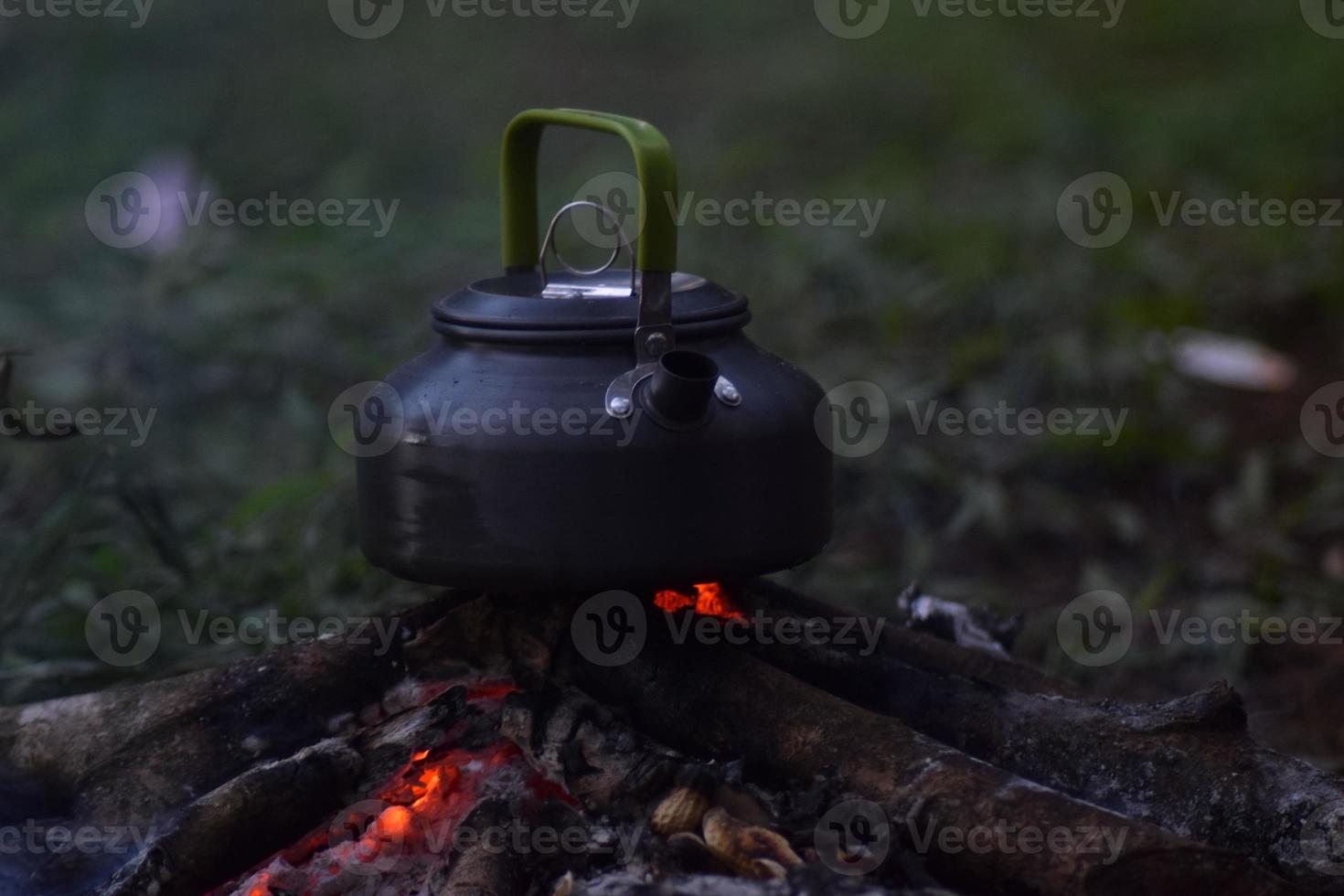 vintage enamel kettle On the wood-burning stove in the morning