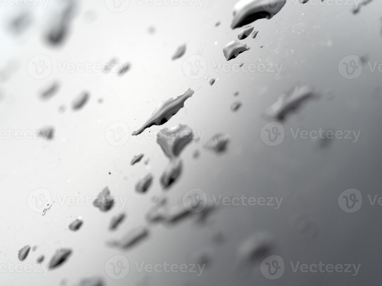 rain water drops on blue metallic surface photo