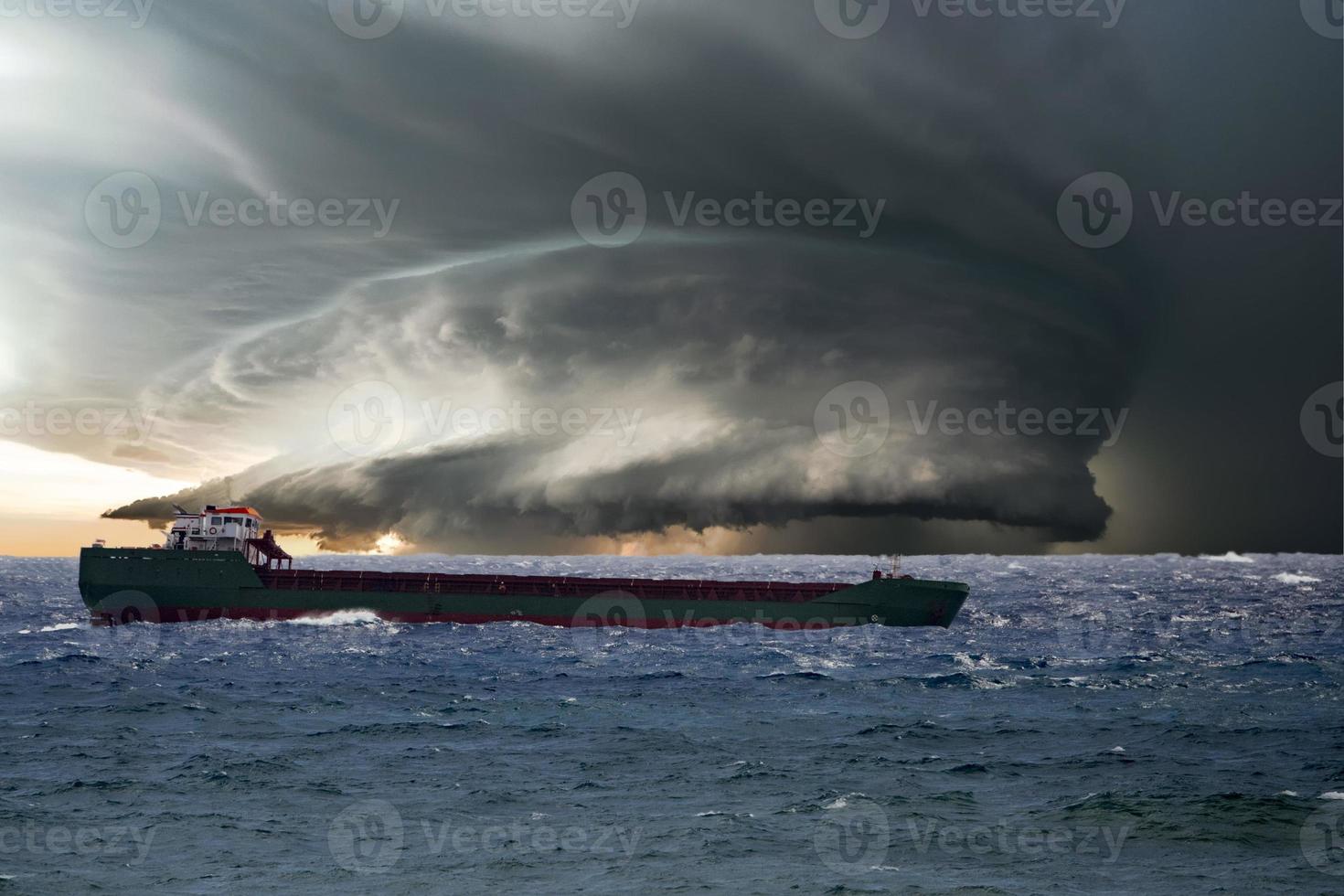 Ship in the tempest huricane cyclone photo