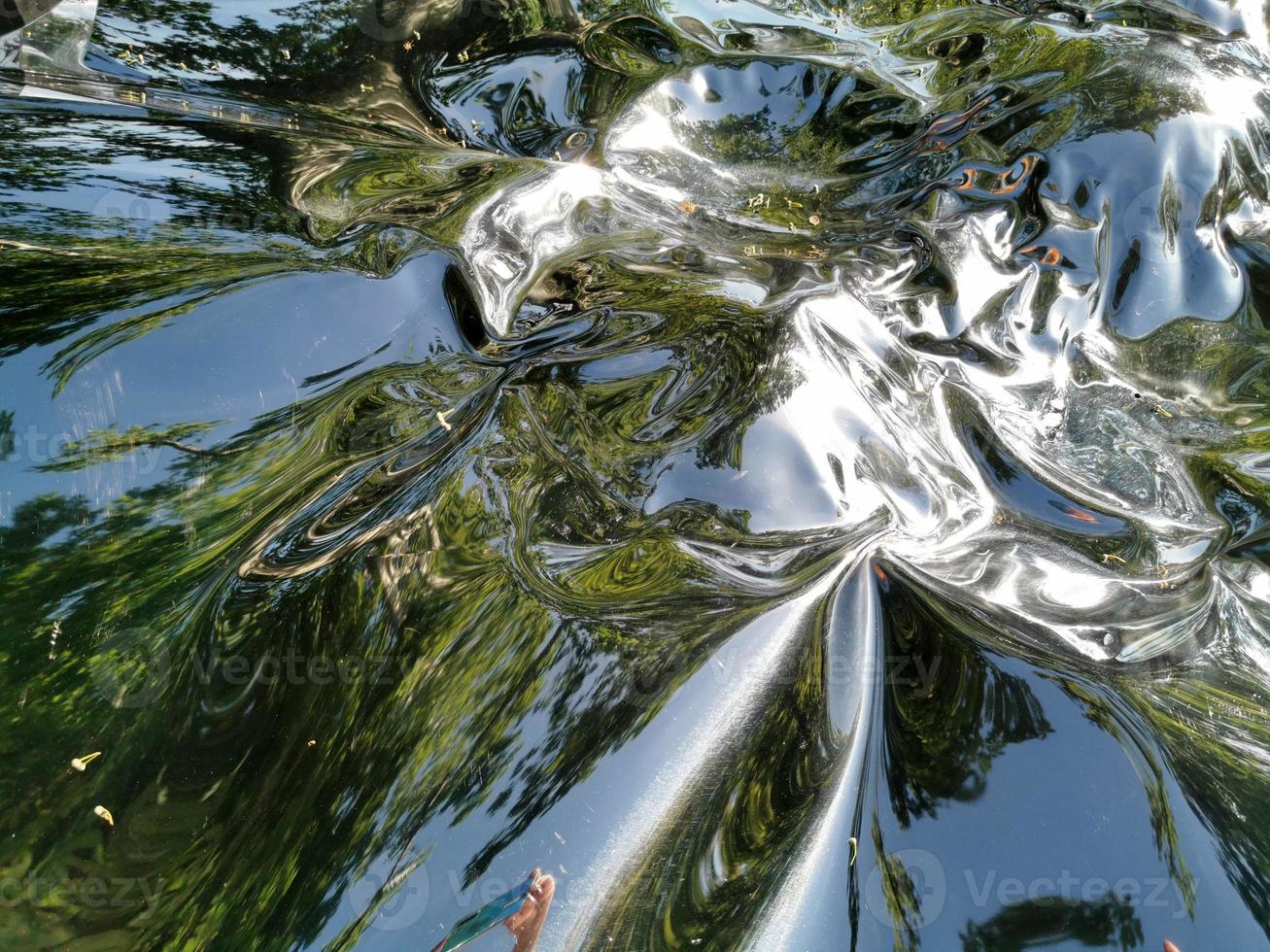 Metallic liquid reflection background photo