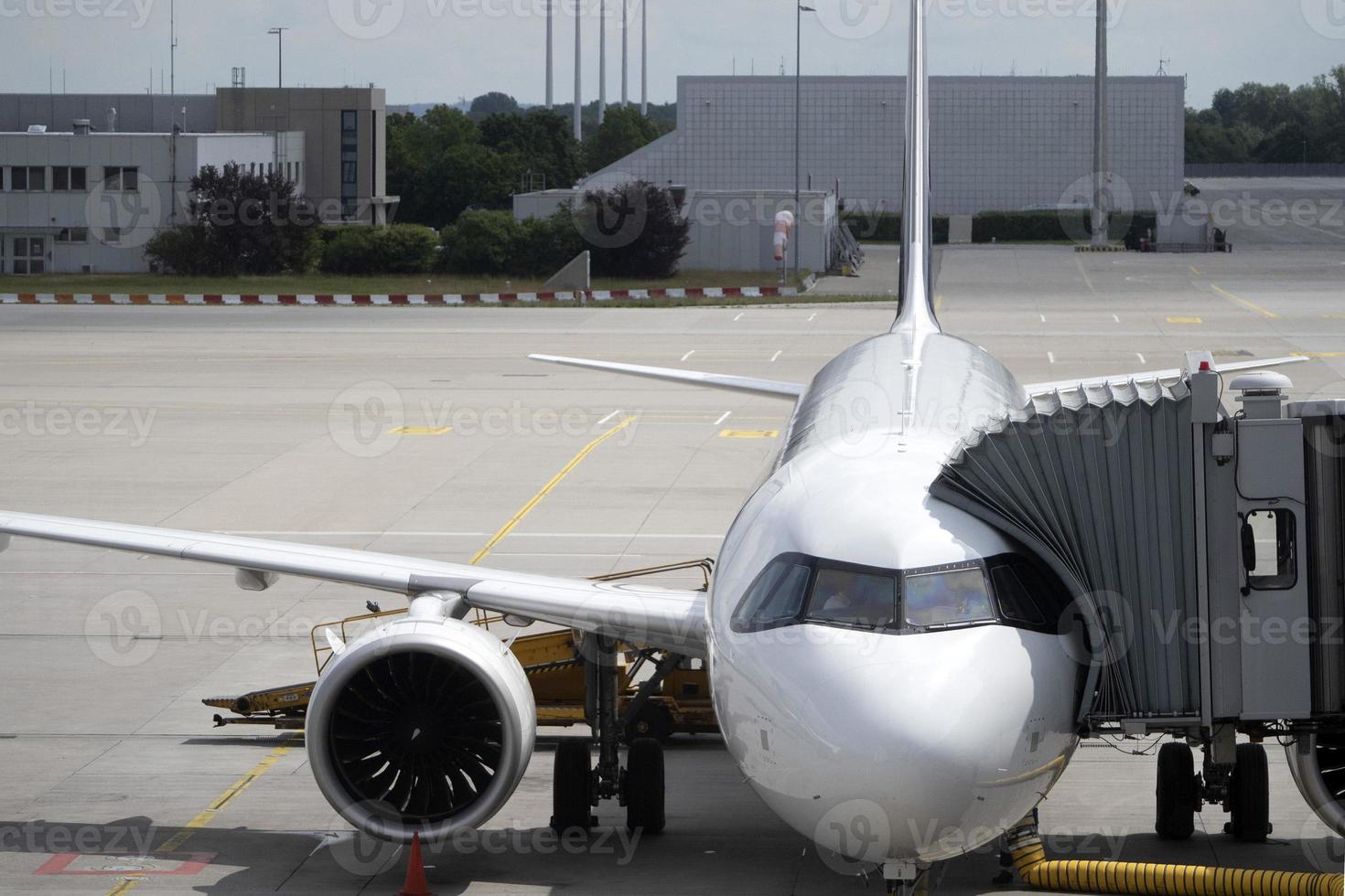 Airplane at the gate preparing to take off photo