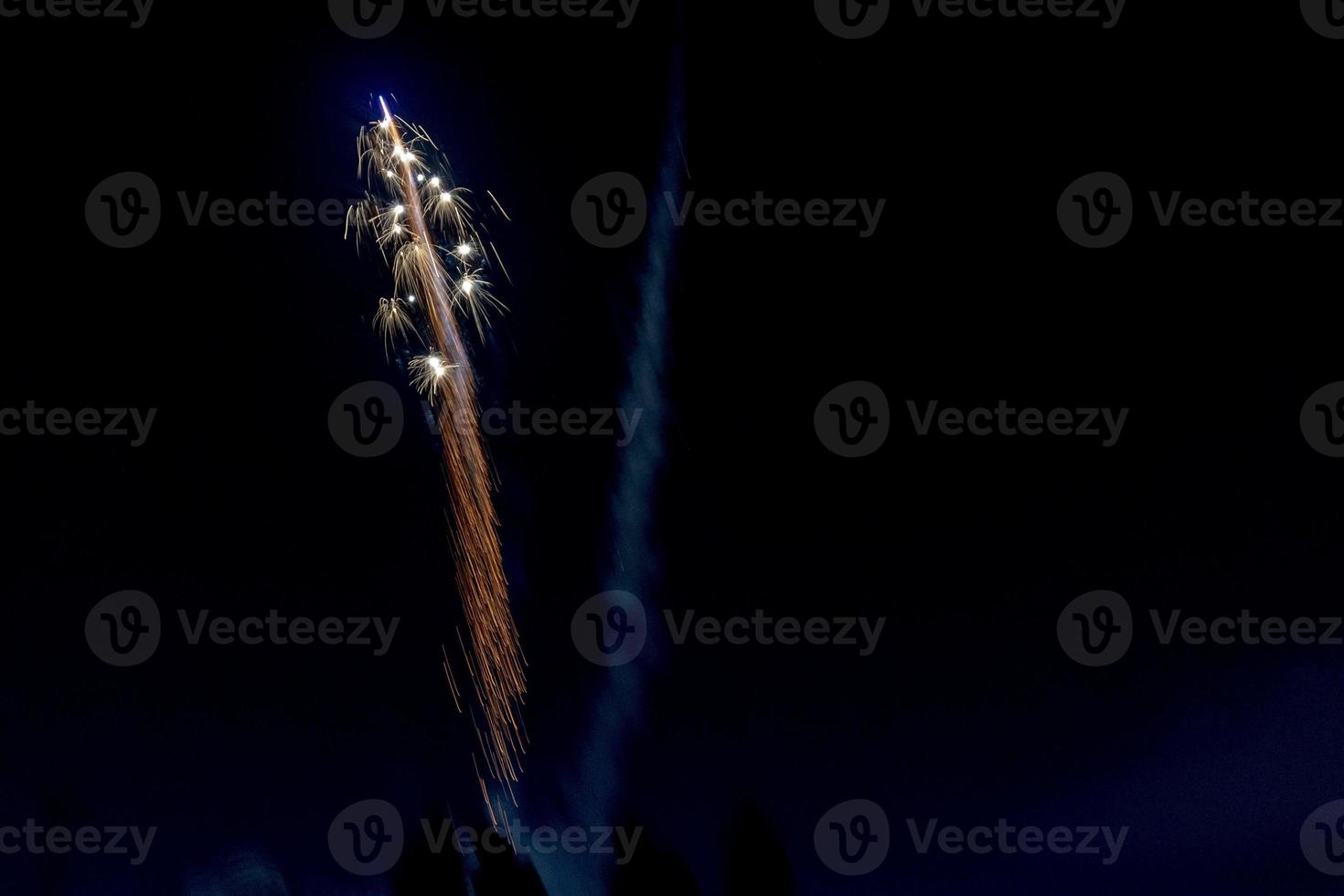 Happy new year and merry xmas fireworks on mountain snow background photo