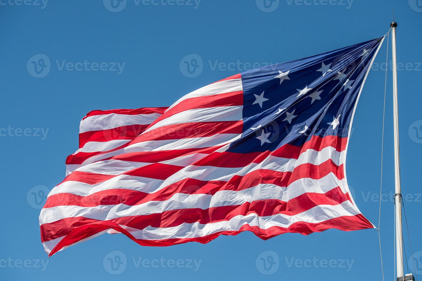 fort mchenry baltimore usa flag while waving photo