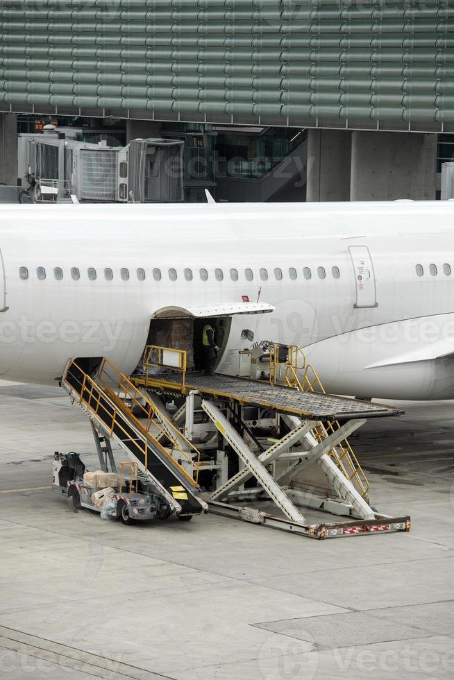 paris airport landing and loading cargo and passenger photo