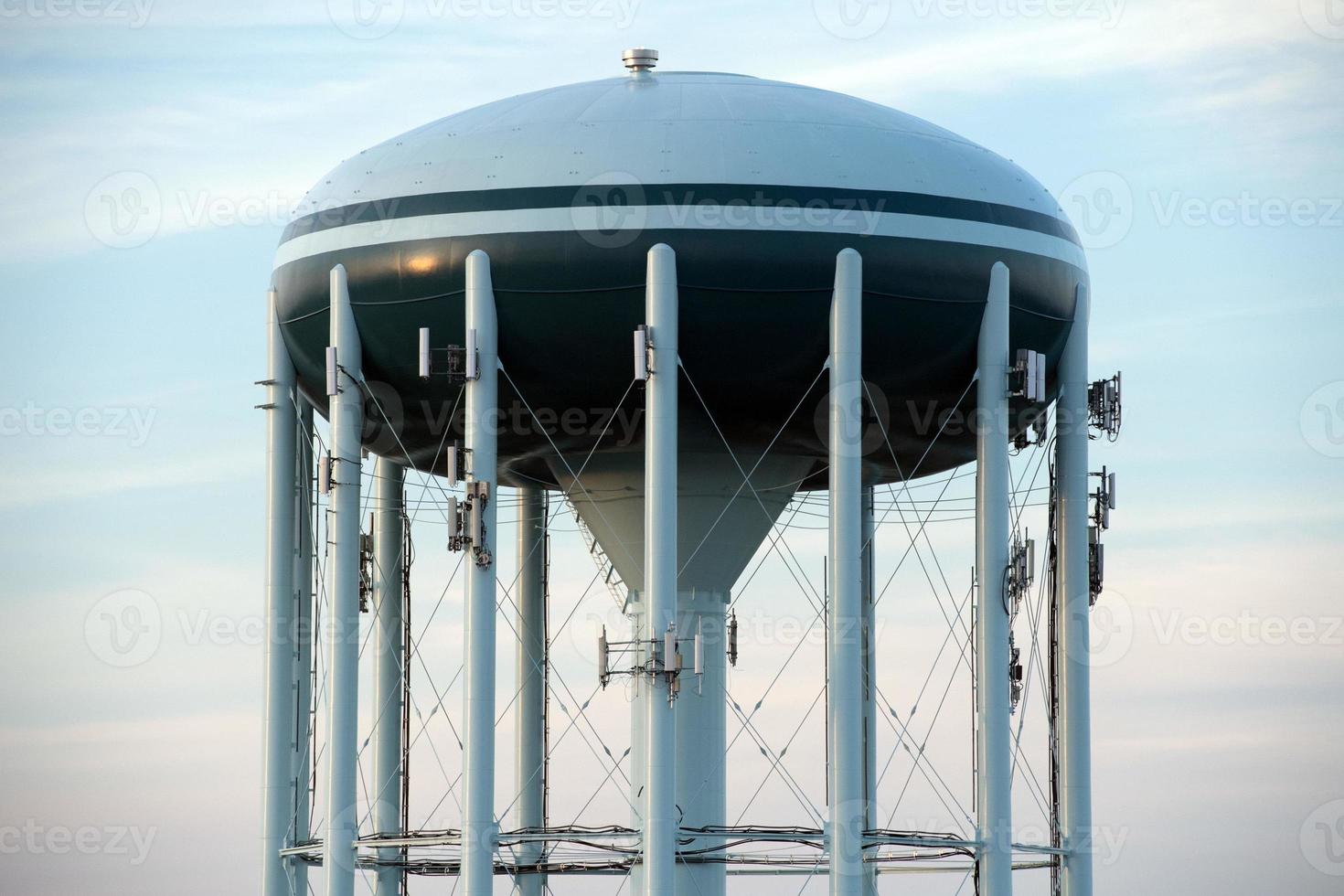 Water tower in the deep blue sky background photo