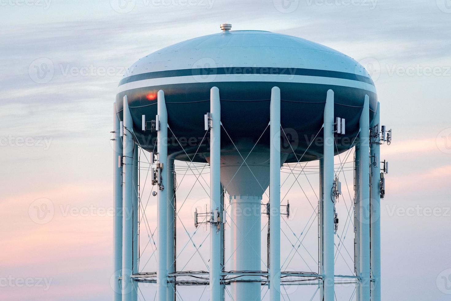 Water tower in the deep blue sky background photo