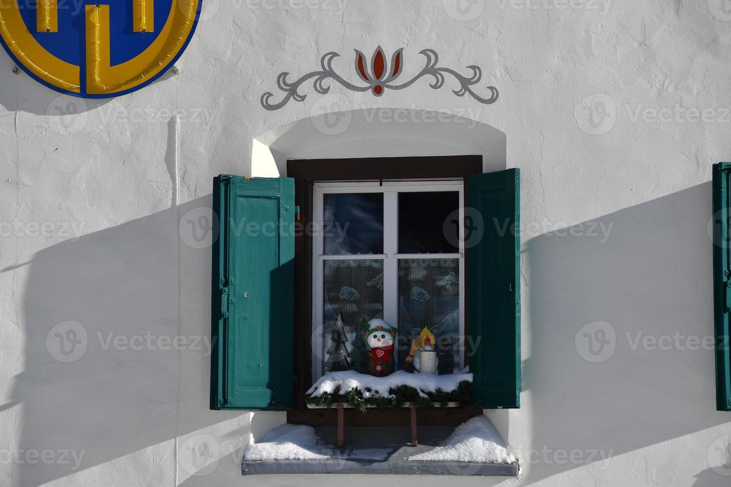 christmas decoration on mountain hut window photo