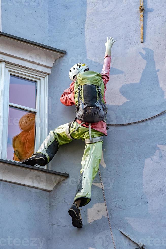 climber on a building photo