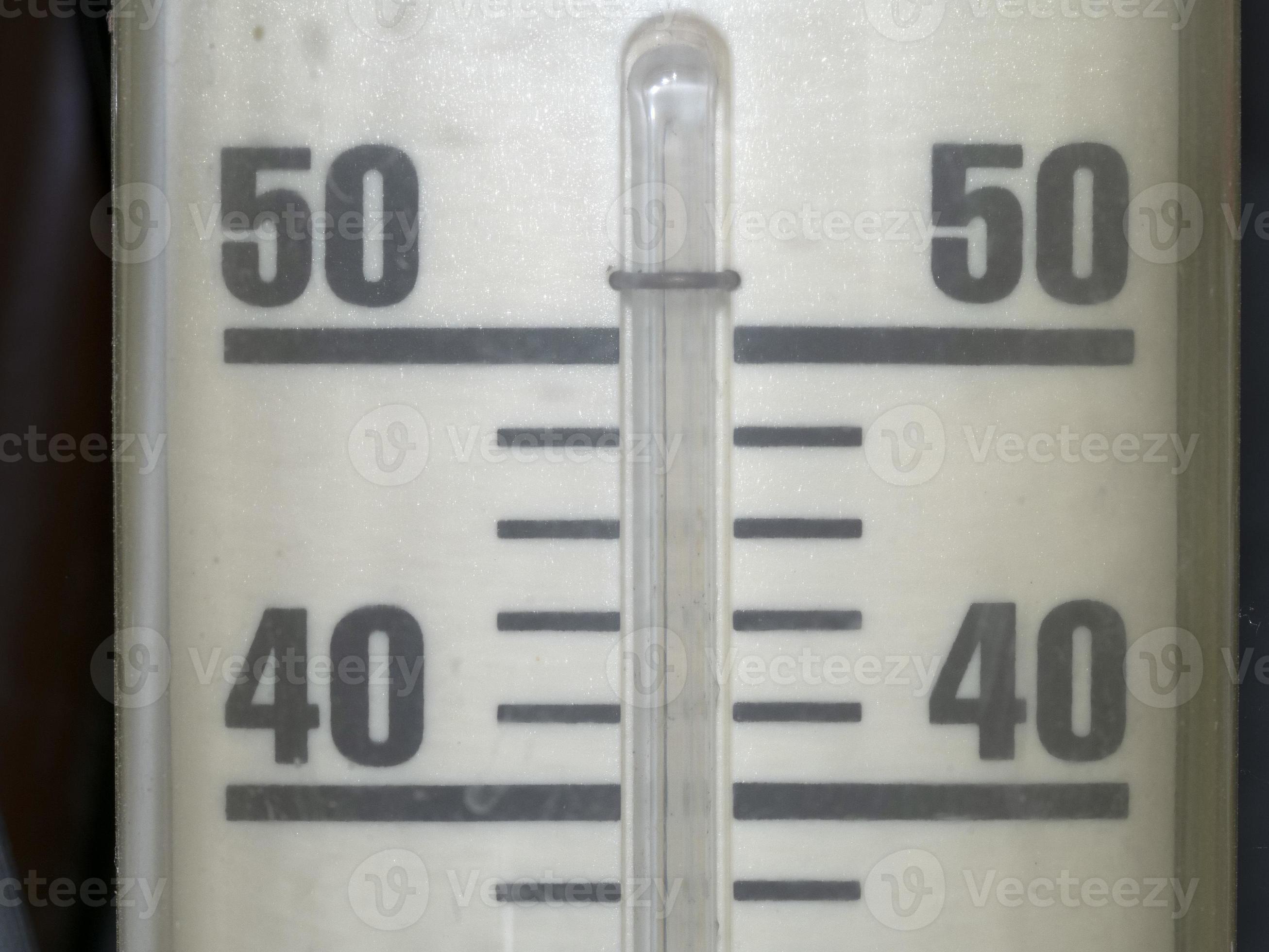 The image presents a close-up view of a thermometer, specifically focusing on the temperature scale between 40 and 50 units. The liquid within the tube currently rests slightly above the 40 mark, suggesting a temperature reading a little over 40 degrees.