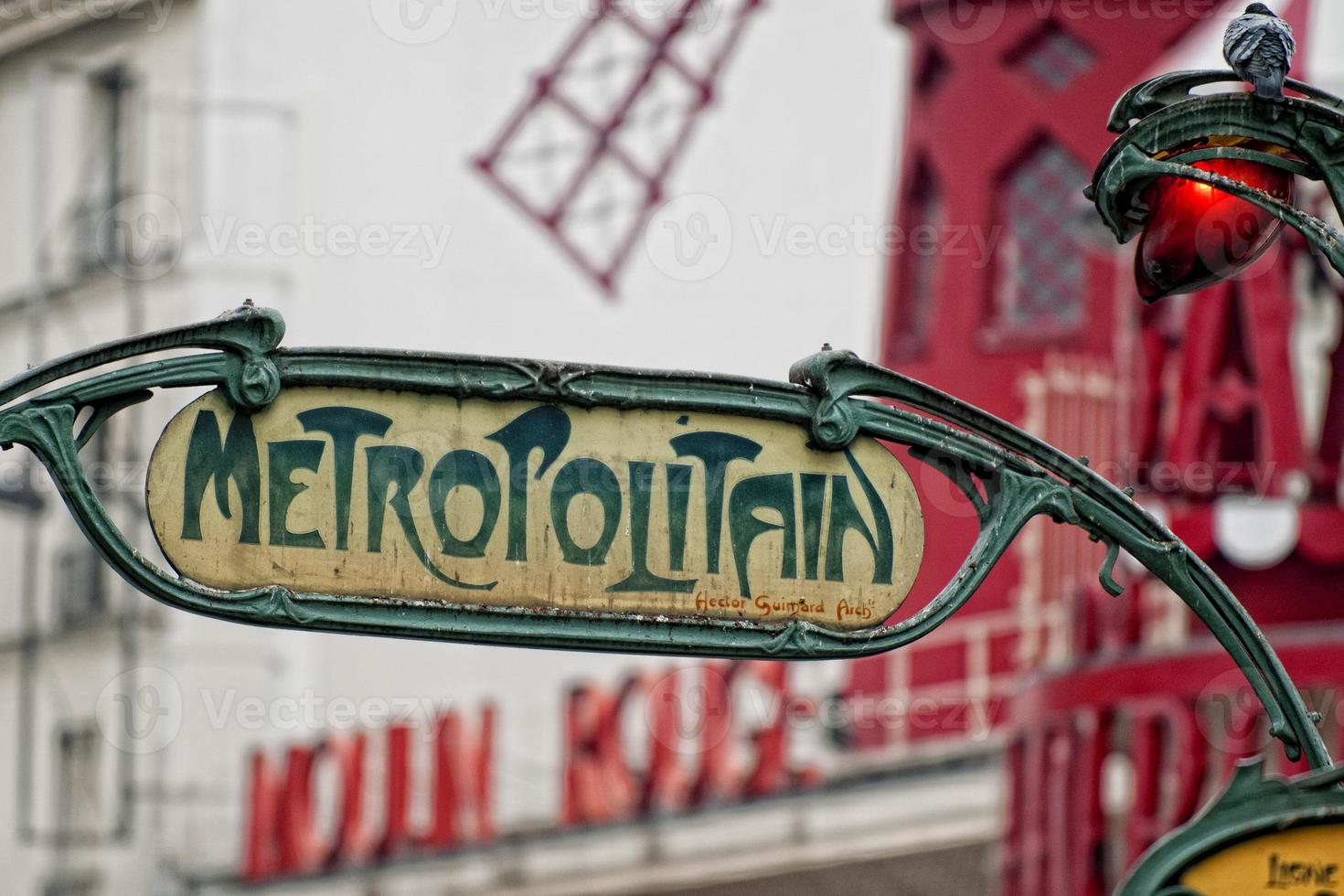 Paris Metro Metropolitain Sign near Moulin Rouge photo