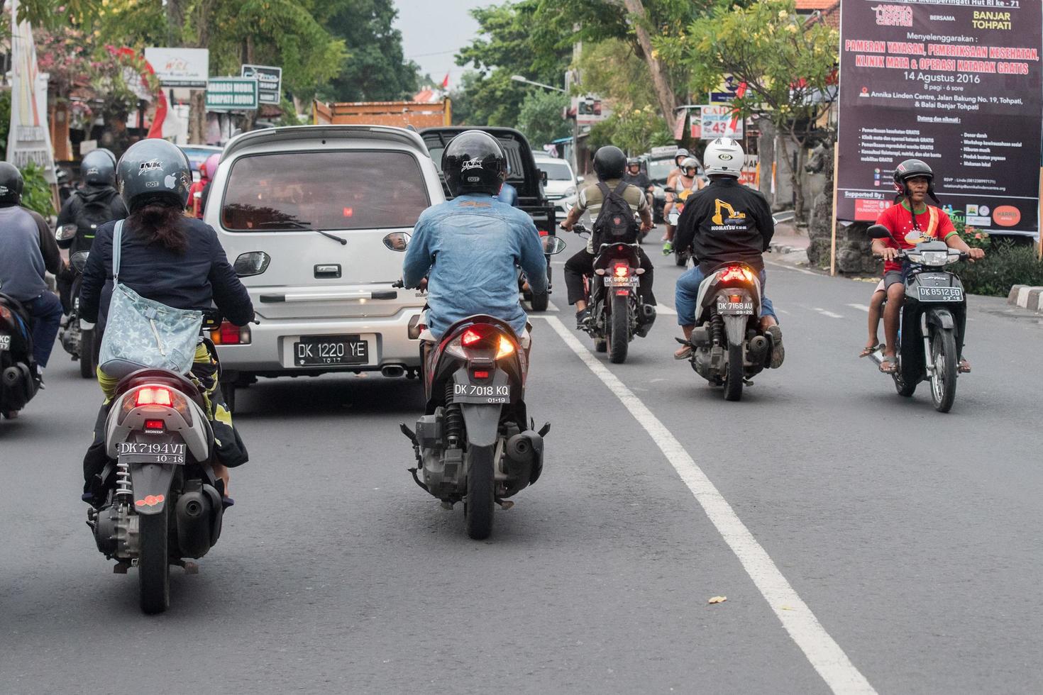 DENPASAR, BALI, INDONESIA - AUGUST 15, 2016 - Indonesia island congested traffic photo