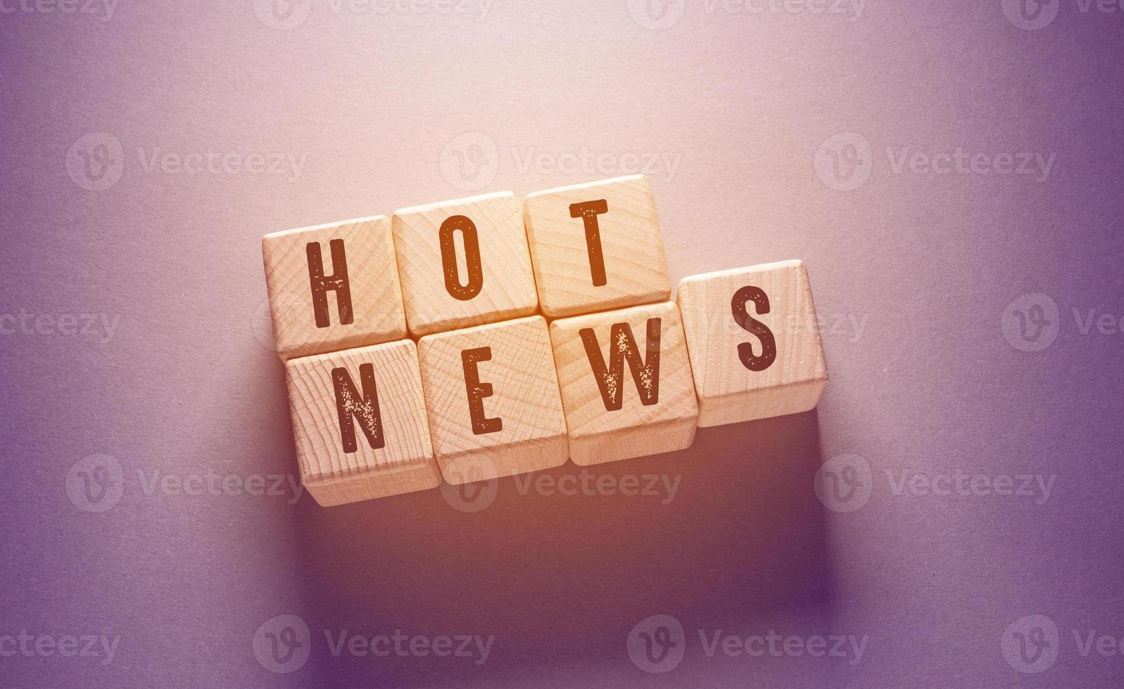 Hot News Word with Wooden Cubes photo