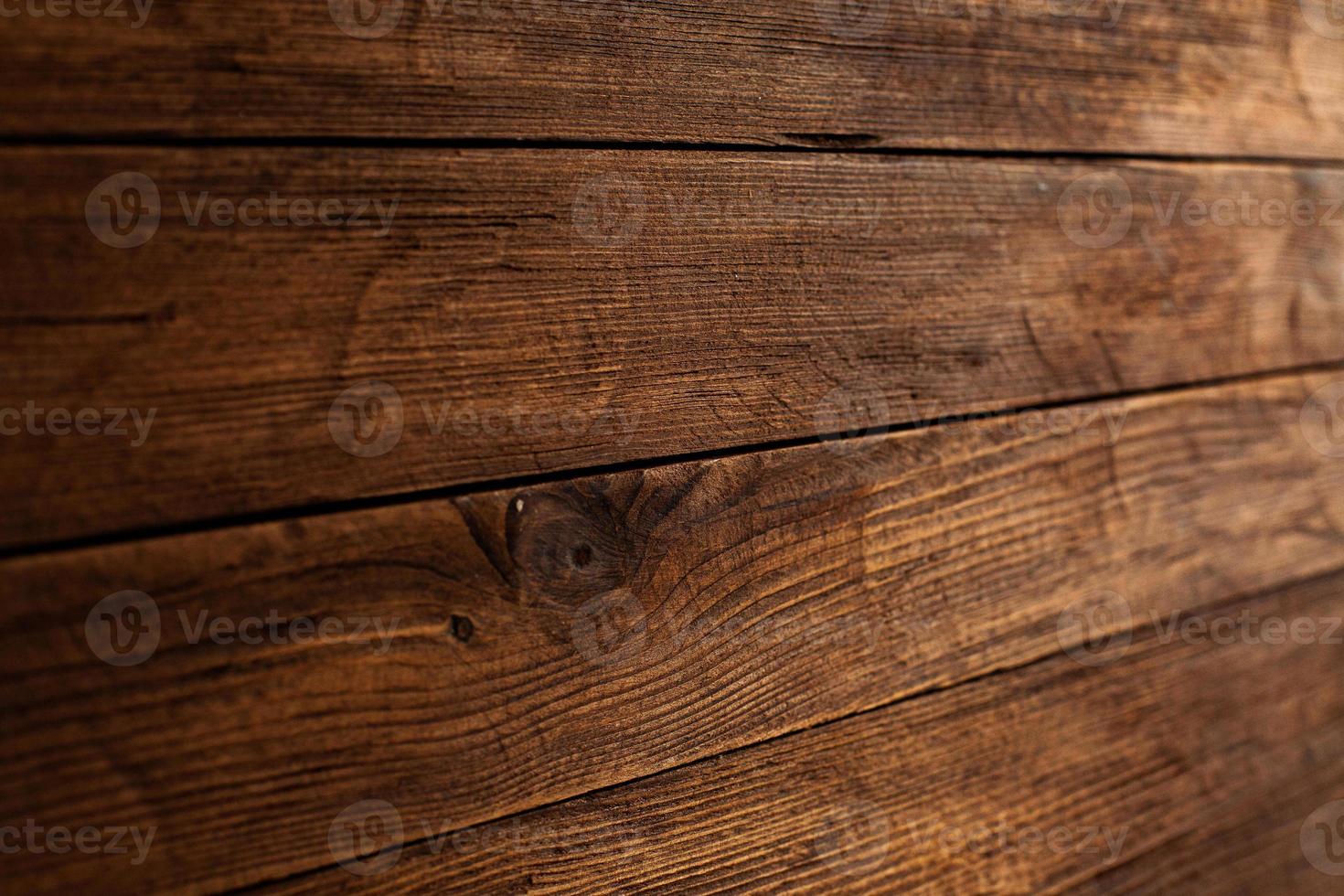 Vintage colored wood background texture with knots and nail holes. Old painted wood wall. Wooden dark horizontal boards. Front view with copy space. photo